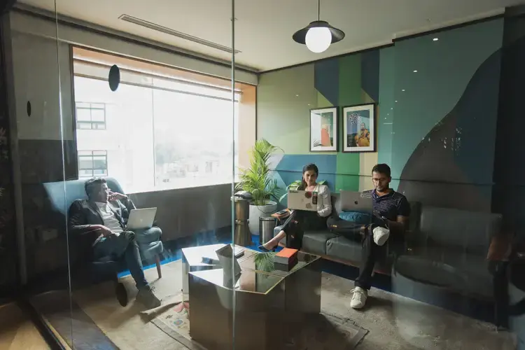 Agency team collaborating in a modern office.